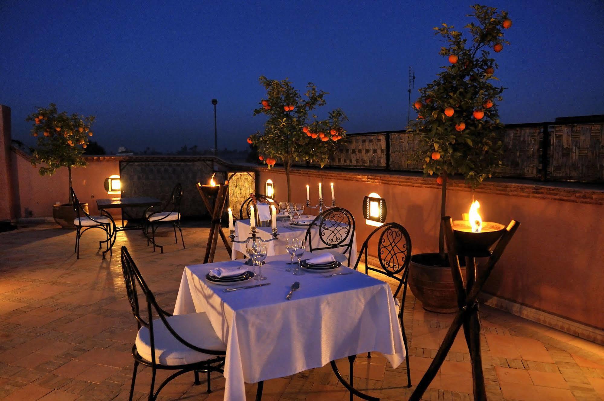 Riad Le Jardin D'Abdou Марракеш Экстерьер фото Rooftop dining at the hotel
